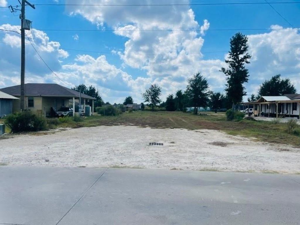 Photo of 2372 County Road 3540, Cleveland, TX 77327 (MLS # 90148420)