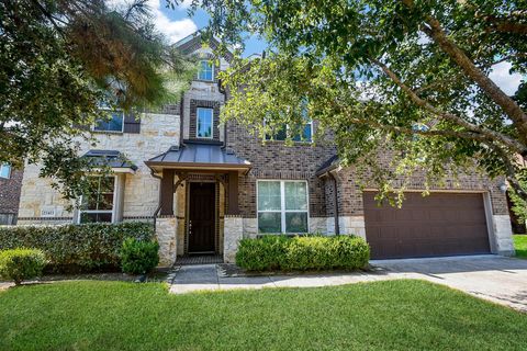 Photo of 27411 Canyon Reach Drive, Katy, TX 77494 (MLS # 71961517) Photo of 27411 Canyon Reach Drive, Katy, TX 77494 (MLS # 71961517)