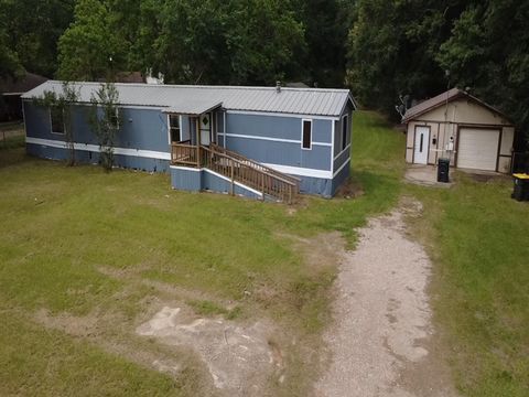 Photo of 1449 Beach Airport Road, Conroe, TX 77301 (MLS # 66594825)