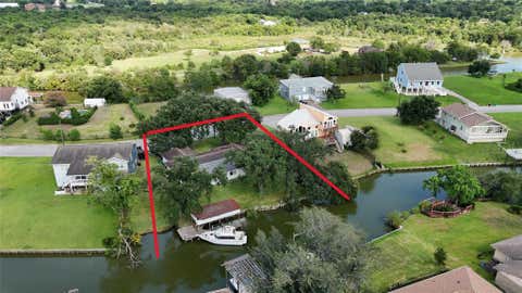 Photo of 211 Rue Orleans Street, Baytown, TX 77520 (MLS # 56805355)