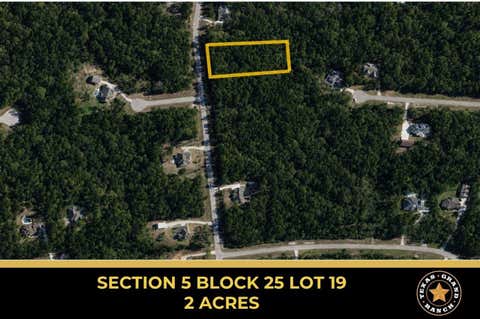 Photo of 5 Feldspar Lane, Huntsville, TX 77340 (MLS # 52821399)