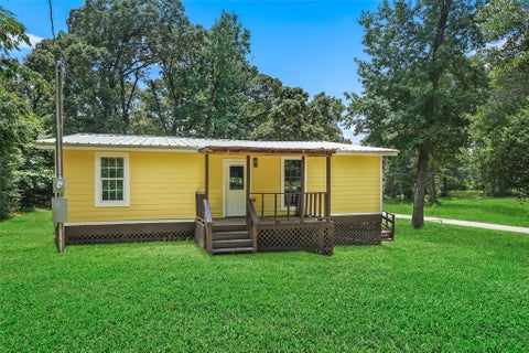 Photo of 601 Faulkner Avenue, Coldspring, TX 77331 (MLS # 73233943)