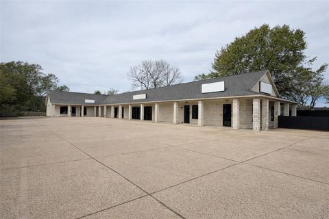 Photo of 2100 Sam Houston Avenue #E, Huntsville, TX 77340 (MLS # 88153259)