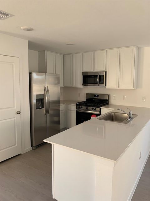 Photo of 21310 Offida Ln, New Caney, TX 77357 (MLS # 64319600)