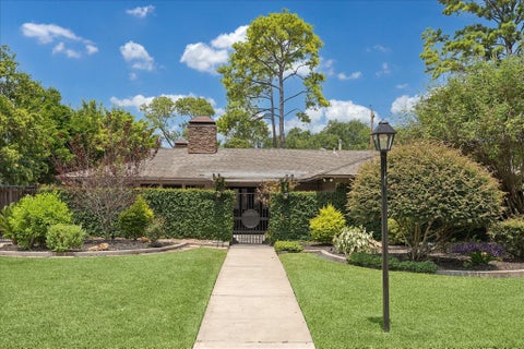 Photo of 10034 Meadow Lake Lane, Houston, TX 77042 (MLS # 22360704)