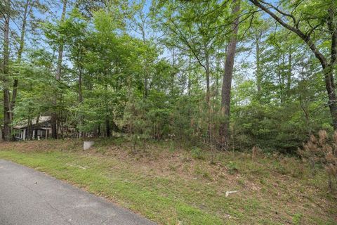 Photo of 75 S Fairway Loop, Coldspring, TX 77331 (MLS # 94400410)