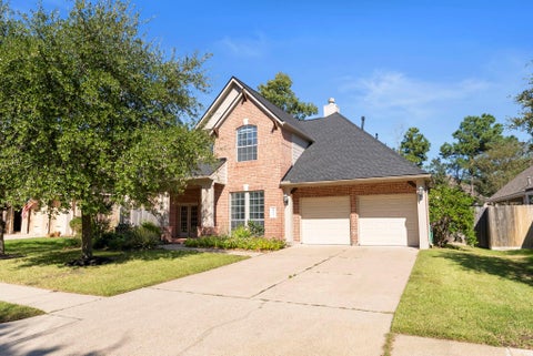 Photo of 431 Hendricks Forest Lane, Conroe, TX 77384 (MLS # 85902729)