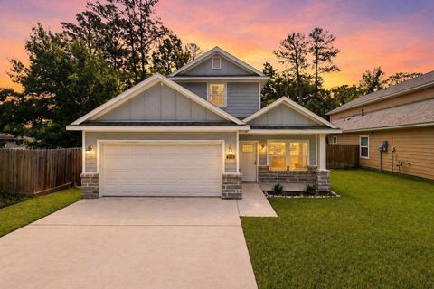 Photo of 719 Cherokee Drive, Conroe, TX 77316 (MLS # 48946727)