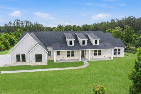 Photo of 16140 Forest Mill Road, Willis, TX 77378 (MLS # 94366959)