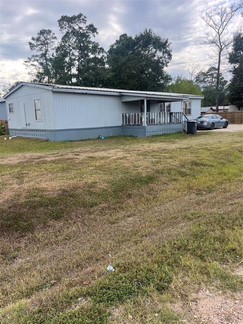 Photo of 8009 Forest Trace Boulevard, Conroe, TX 77306 (MLS # 73148827)