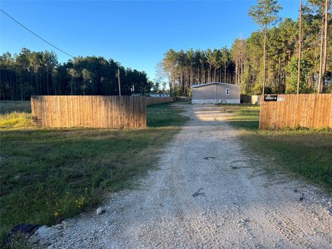 Photo of 43 County Road 5033, Cleveland, TX 77327 (MLS # 21387810)