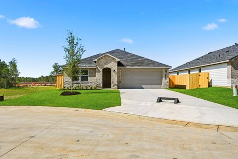 Photo of 818 Merit Badge Trail, Conroe, TX 77303 (MLS # 14604118)