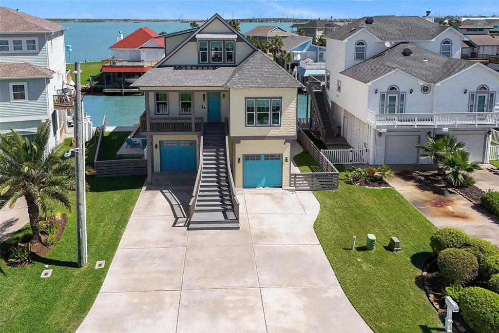 Photo of 1534 Windsong Way, Tiki Island, TX 77554 (MLS # 94503844)