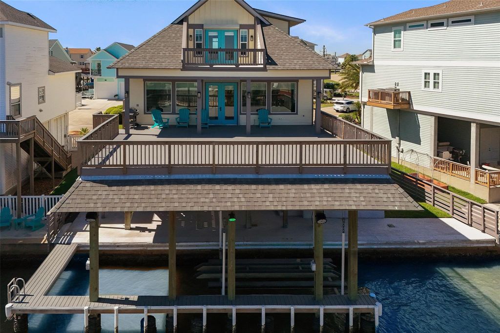 Photo of 1534 Windsong Way, Tiki Island, TX 77554 (MLS # 94503844)