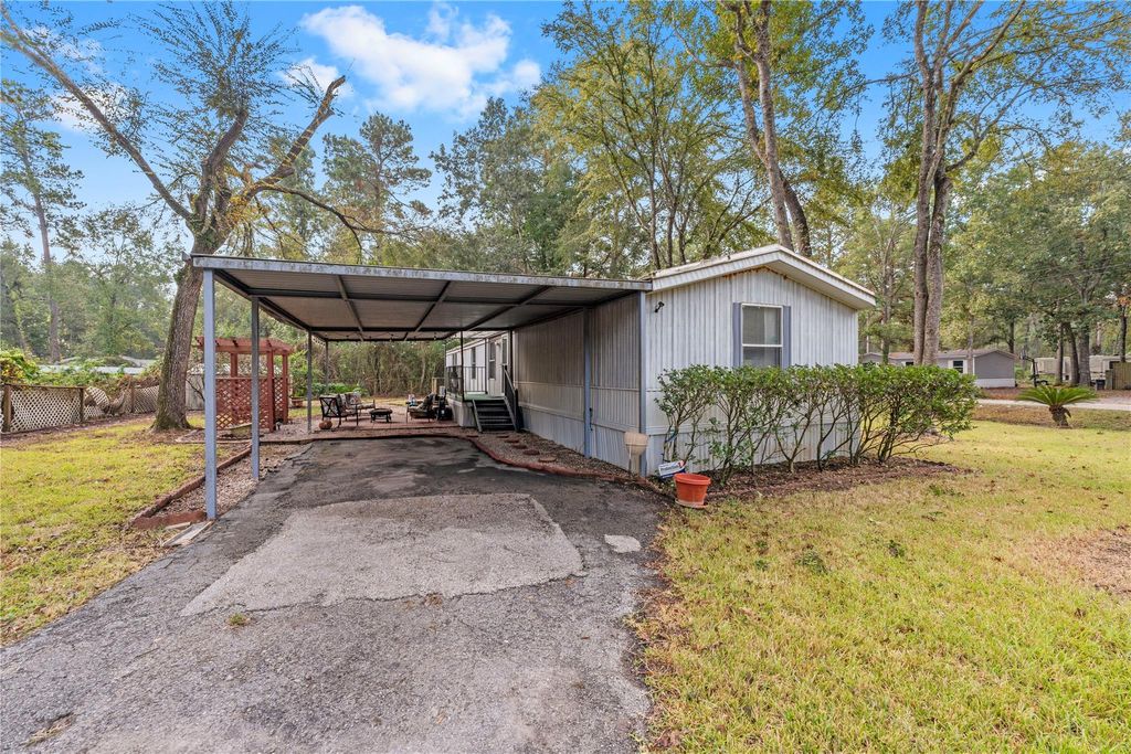 Photo of 23663 Daffodil Lane, Porter, TX 77365 (MLS # 26385768)