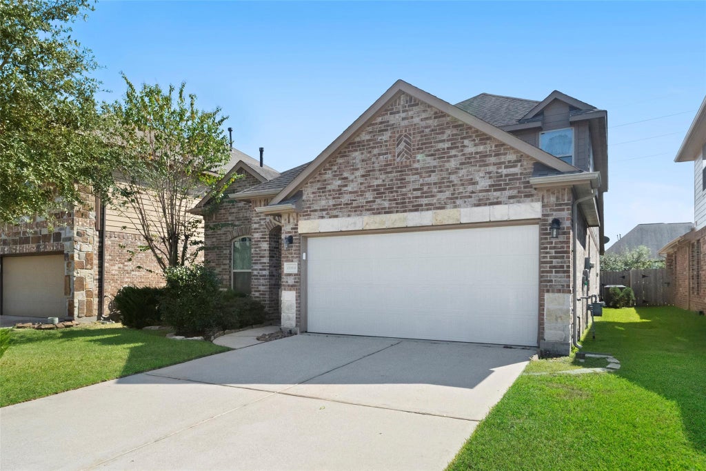 Photo of 13206 Clover Creek Point Lane, Humble, TX 77346 (MLS # 63620372)
