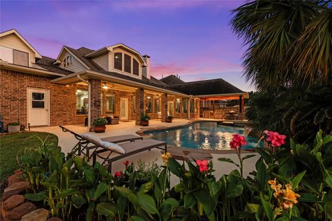 Photo of 8607 Crossriver Lane, Houston, TX 77095 (MLS # 97464751)
