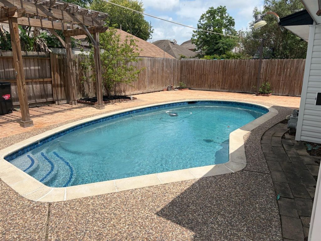 Photo of 4727 Black Rock Street, Baytown, TX 77521 (MLS # 63880714)