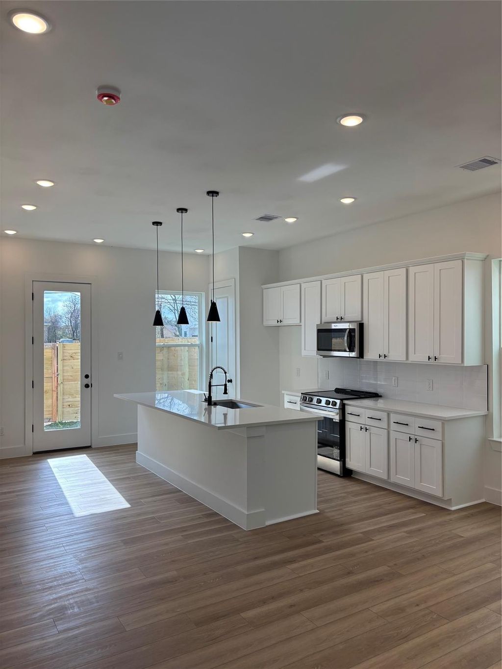 Photo of 1464 Ferguson Way Way #A, Houston, TX 77088 (MLS # 13291232)