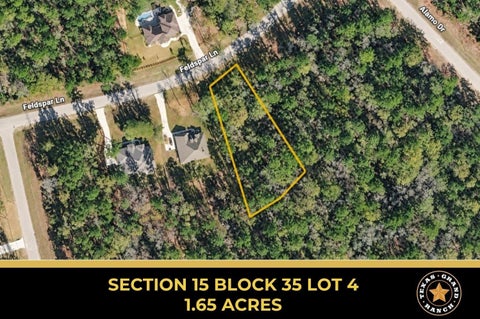 Photo of 15 Feldspar Lane, Huntsville, TX 77340 (MLS # 36215765)