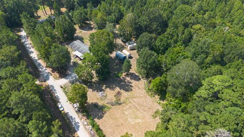 Photo of 1031 Morris Creek Road, Coldspring, TX 77331 (MLS # 57331234)