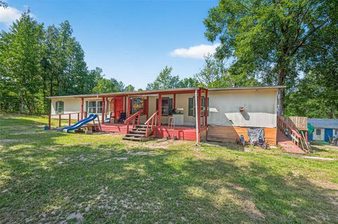 Photo of 1031 Morris Creek Road, Coldspring, TX 77331 (MLS # 57331234)