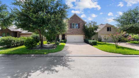 Photo of 39 Wood Drake Place, Tomball, TX 77375 (MLS # 92159002)