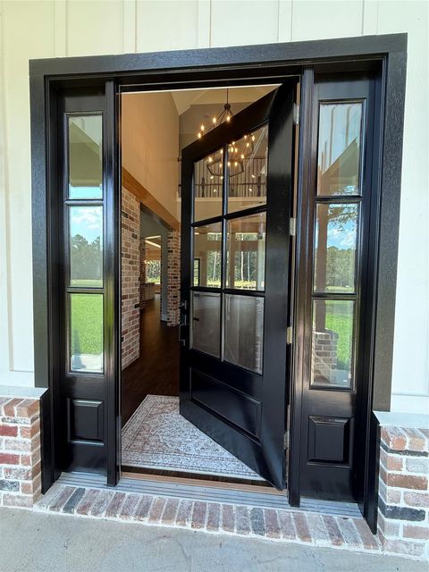 Photo of 41 Pausel Road, Huntsville, TX 77340 (MLS # 39737175)