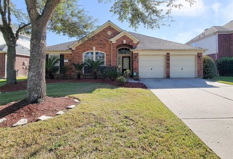 Photo of 9514 Garnet Falls Lane, Humble, TX 77396 (MLS # 62535520)