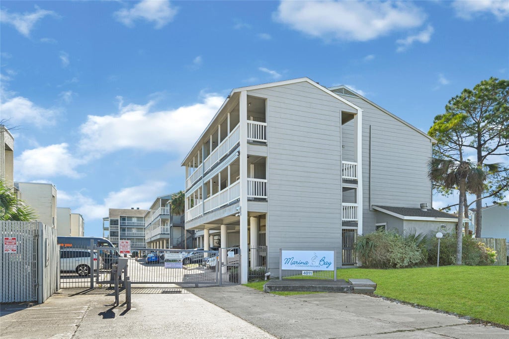Photo of 4011 Nasa Rd 1 #406, El Lago, TX 77586 (MLS # 92279470)