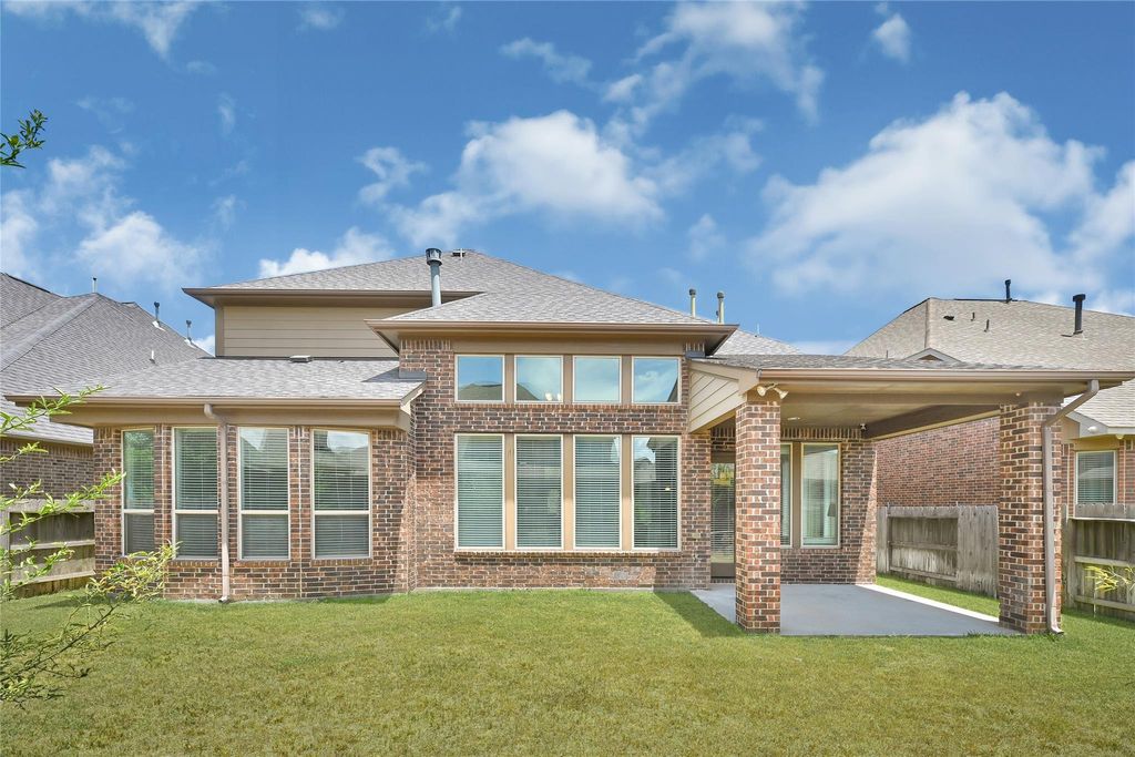 Photo of 27915 Genesis Manor Ln, Katy, TX 77494 (MLS # 62904130)