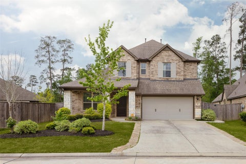 Photo of 285 Trillium Park Loop, Conroe, TX 77304 (MLS # 77451370)