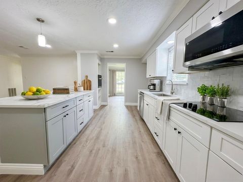 Photo of 14011 Wickersham Lane, Houston, TX 77077 (MLS # 19526702)