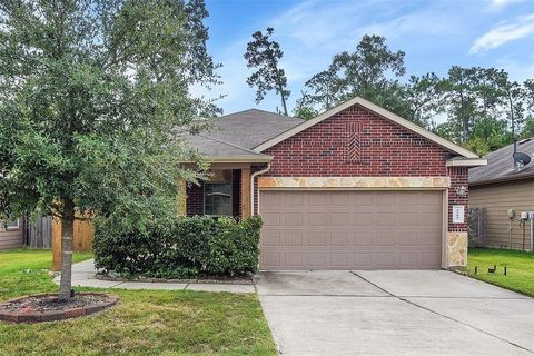 Photo of 9505 E Woodmark, Conroe, TX 77304 (MLS # 83706857)