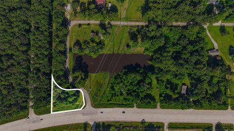 Photo of TBD Clark Street, Porter Heights, TX 77302 (MLS # 97232960)