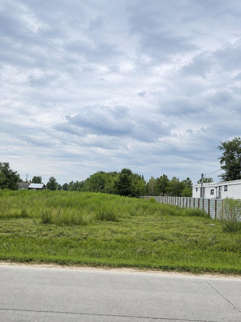 Photo of 1711 County Road 3542, Cleveland, TX 77327 (MLS # 15066543)