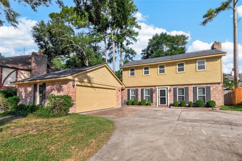 Photo of 9 Arlington Street, Conroe, TX 77301 (MLS # 87233625)