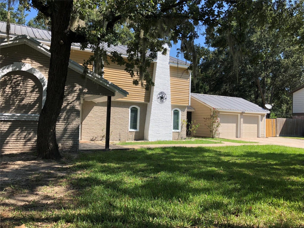 Photo of 2606 N Woodloch Street, Woodloch, TX 77385 (MLS # 62937768)