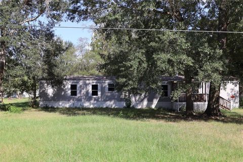 Photo of 128 County Road 3310c, Cleveland, TX 77327 (MLS # 35701989)