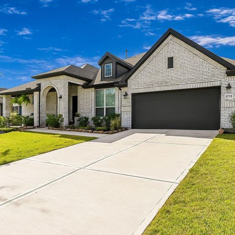 Photo of 6715 Arrowbrook Cove Ln Ln, Katy, TX 77493 (MLS # 69744706)