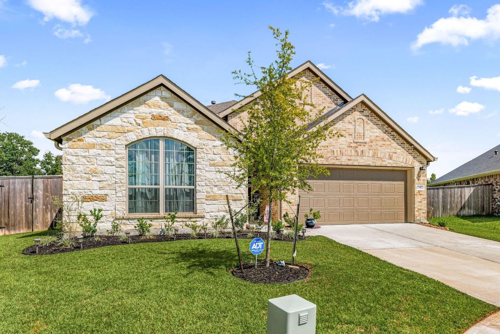 Photo of 23412 Sentosa Bluff Court, New Caney, TX 77357 (MLS # 10524228)