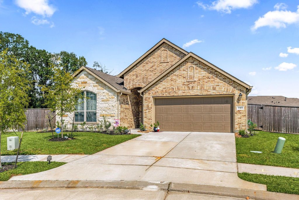 Photo of 23412 Sentosa Bluff Court, New Caney, TX 77357 (MLS # 10524228)