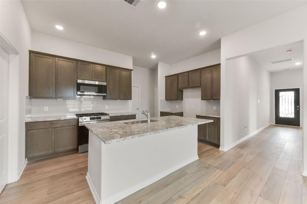 Photo of 232 Harlingen Drive, Magnolia, TX 77354 (MLS # 64003951)