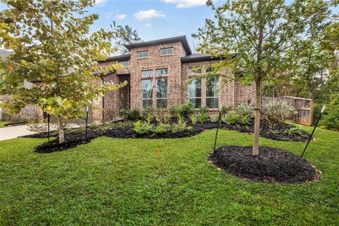 Photo of 633 North Rivus Overlook Drive, Willis, TX 77318 (MLS # 12961355)