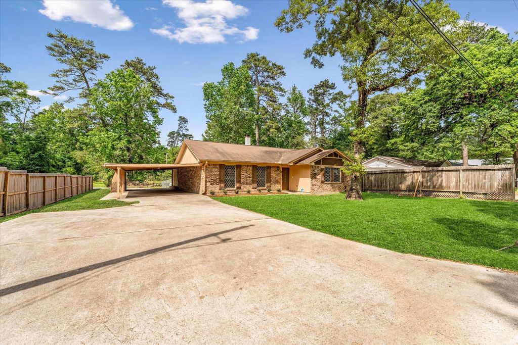 Photo of 12118 Quail Hollow Lane, Pinehurst, TX 77362 (MLS # 53559543)