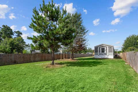 Photo of 522 Road 5201, Cleveland, TX 77327 (MLS # 74668333)