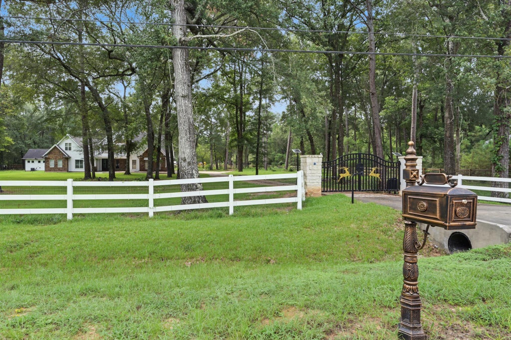 Photo of 10933 Lake Forest Drive, Conroe, TX 77384 (MLS # 76418885)