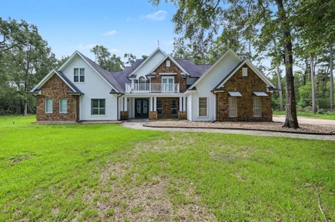 Photo of 10933 Lake Forest Drive, Conroe, TX 77384 (MLS # 76418885)