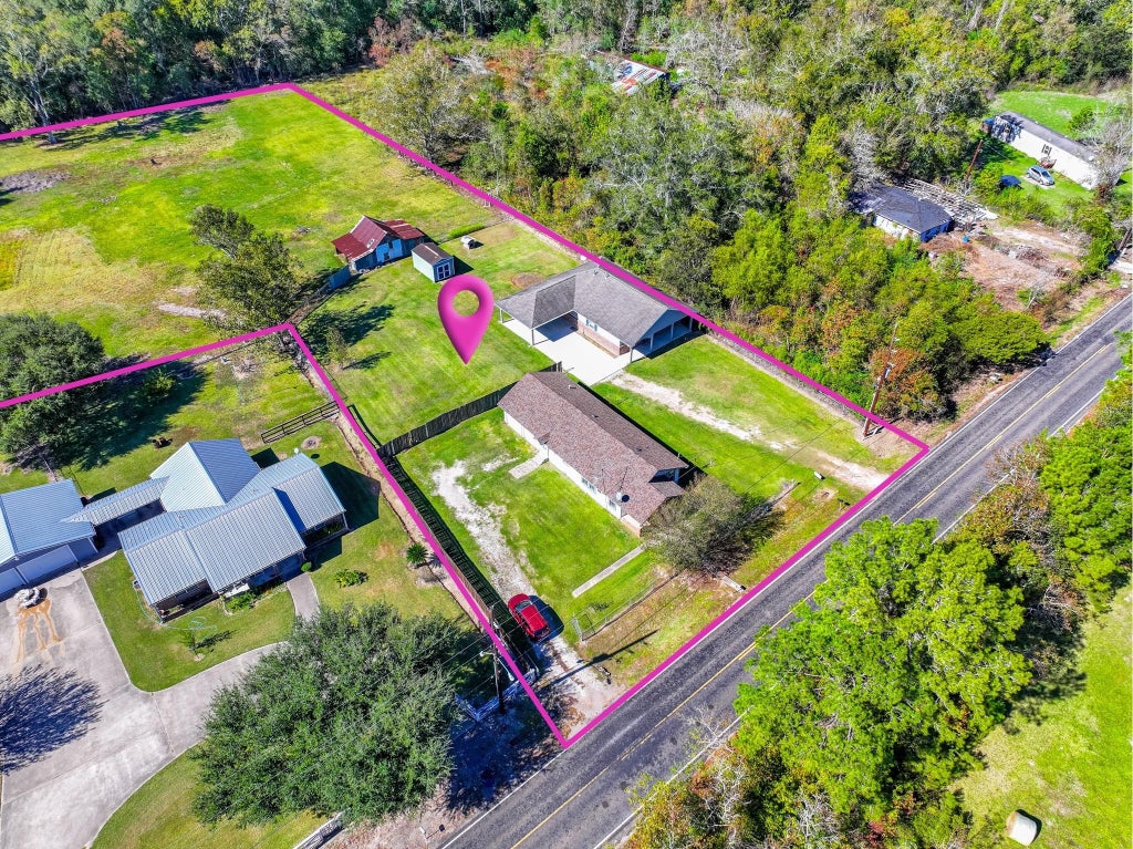 Photo of 816 Martin Luther King Road, Ames, TX 77575 (MLS # 23567676)