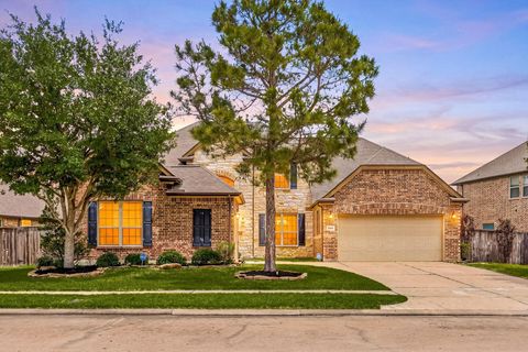 Photo of 9338 Taylor Cliff Lane, Cypress, TX 77433 (MLS # 21073685)